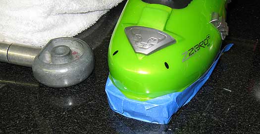 Fitting backcountry ski boots for ski mountaineering. Water was puddled inside the boot to prevent sole warpage, but protecting the lower sole plastic from heat was also the ticket.