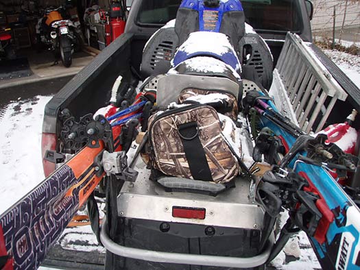 Snowmobile ski carry for backcountry skiing. Snowmobile ski carry for backcountry skiing.