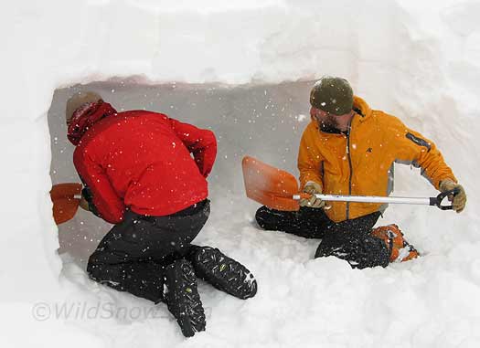 We practiced some speedy snowcave building. In this technique, you start with a wall that two or three people can dig side-by-side into, then after hollowing out most of your cave you wall up the opening with snow blocks and dig a lower elevation door portal. Amazing how fast this is compared to the mole burrow technique. We practiced some speedy snowcave building. In this technique, you start with a wall that two or three people can dig side-by-side into, then after hollowing out most of your cave you wall up the opening with snow blocks and dig a lower elevation door portal. Amazing how fast this is compared to the mole burrow technique.