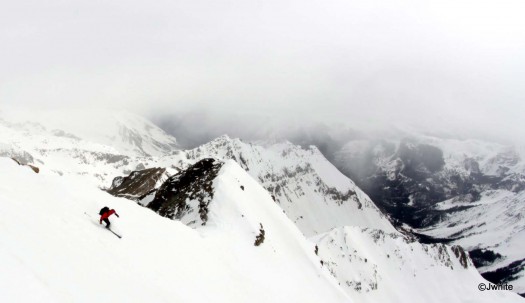 5-8-10-Castle-TylerView Tyler carves up the wind buffed powder on the upper east face.