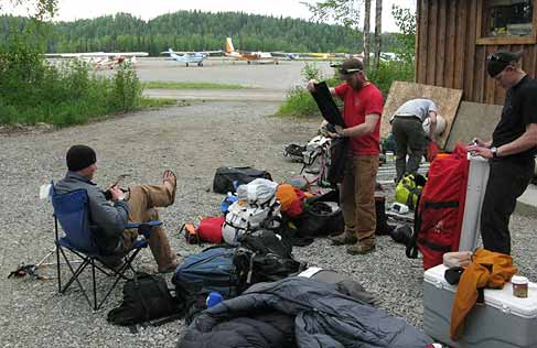 At the airstrip, we continue to spread stuff around like a gear store. Talkeetna