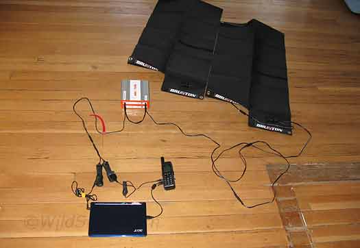 00-solar-satphone-at-home The system laid out at WildSnow HQ. Quite simple, really. The batteries are necessary to act as a charge reserve/controller/buffer/voltage-regulator.