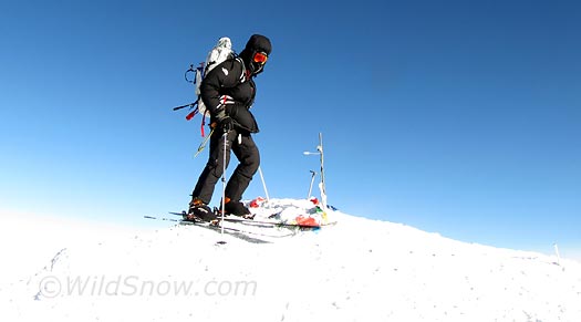 IMG_0308-summit-louski Lou with his planks on the summit tip. Louie did the same thing but the camera malfed for his hero shot. Shucks. But the memory will live. The snow off the summit and down to 17,000 feet was incredibly variable, everything from powder to super hard white-ice. Difficult in our wasted state, but doable -- and a lot faster than walking.