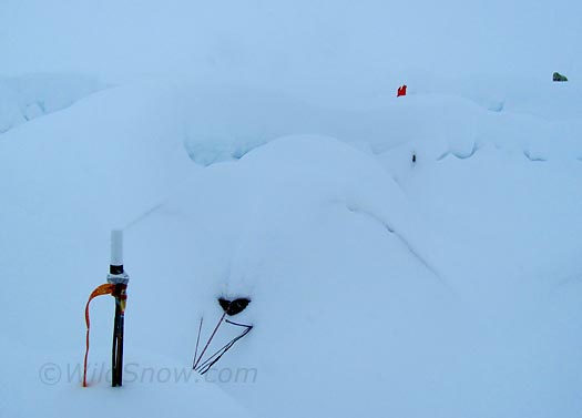 IMG_0897-buried-tent-lous Lou and Louie's tent before shoveling, you can perhaps see a few guylines. The vertical object in front is my remote satphone antenna.