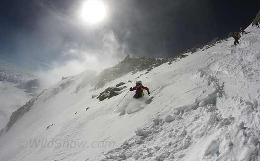 IMG_6904-tyler-headwall Tyler starts the Headwall. We were frankly amazed at how well this powder was bonding to blue ice a short distance underneath.