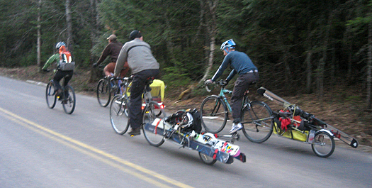 biking-up Bikes, skis, hiking boots, ski boots, rain gear, snow gear, shorts, flip flops, water, bear spray, lunch, skins, wax, lube? Check.