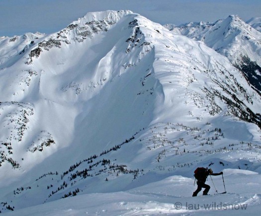 Skinning up to Vantage Peak. Our backcountry skiing failure on Duke’s N face in the background