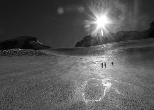 Baker climb and skiing, sunburst on the glacier.
