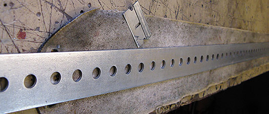 Cutting climbing skins to be skinny.
