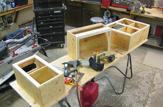 Cabinet upper wall hangers in shop. Cabinet upper wall hangers in shop.
