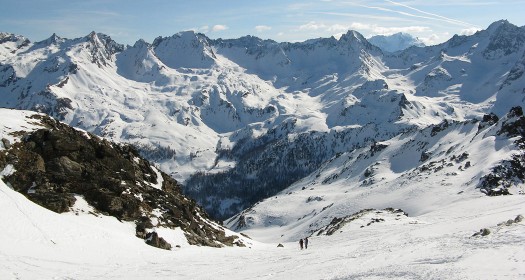 Looking what I think is southeast, Gran Paradiso is the peak in the distance, a 4061 meter alp well known to Italians out of Torino and elsewhere. The immediate terrain is used by the helicopters but also yields ski tours, off to the right a couple of huts are always available if you don't want to leave. Looking what I think is southeast, Gran Paradiso is the peak in the distance.
