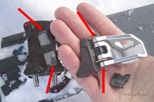 Dynafit Radical heel breakage such as this is said to be rare. Arrows to left indicate where the metal tabs break. Dynafit Radical heel breakage such as this is said to be rare.