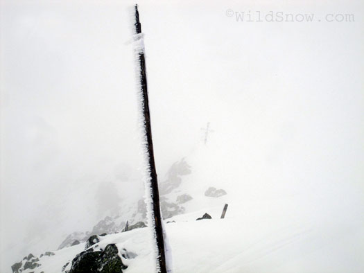 Not much to see at the top. The cross marks the true summit. Not much to see at the top. The cross marks the true summit.