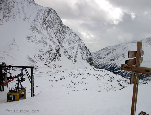 Many choose to ride the gondola down. We opt for our planks and ski carefully down as the clouds darken. Many choose to ride the gondola down. We opt for our planks and ski carefully down as the clouds darken