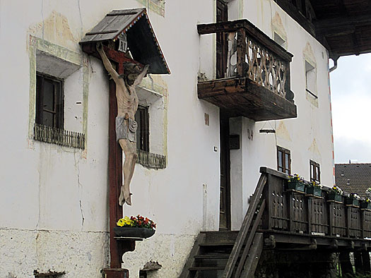 Katharinaberghof Next to the steeple in Katharinaberghof, a crucifix on an old barn