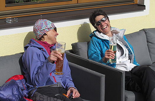 The WildSnow girls share a laugh over traditional refreshments. You literally walked about 200 feet from the bridge to the gasthaus sun porch. The WildSnow girls share a laugh over traditional refreshments. You literally walked about 200 feet from the bridge to the gasthaus sun porch.