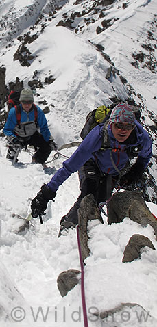 Lisa climbing in Europe with Mountain Equipment jacket. Vertical. Lisa climbing in Europe with Mountain Equipment jacket.