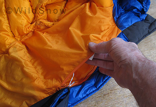 Interior vest pocket is too small to reverse and stuff the jacket in for storage. Interior vest pocket is too small to reverse and stuff the jacket in for storage.
