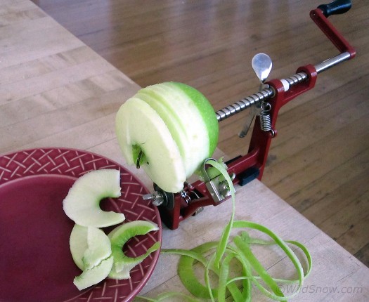 Peel apples with handy apple peeler. Peel apples with handy apple peeler.