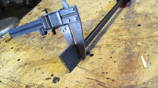 Using some calipers I determined how far up the blade I'd chop to get the thickness correct. This can easily be done by eye and trial. Using some calipers I determined how far up the blade I'd chop to get the thickness correct. This can easily be done by eye and trial.
