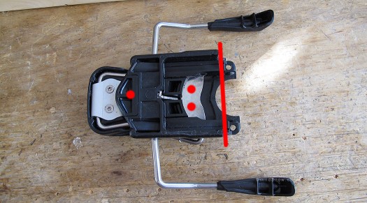 Looking at the G3 brake from underneath, red indicates the three holes I drilled as well as where I cut the back off the plastic housing. Looking at the G3 brake from underneath, red indicates the three holes I drilled as well as where I cut the back off the plastic housing.