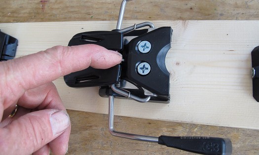 To enable the brake for downhill skiing, you push on the tiny catch and release the arms. To enable the brake for downhill skiing, you push on the tiny catch and release the arms.