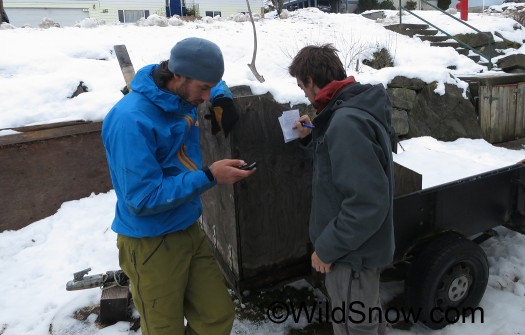 Louie gets essential phone number from Cam for setting up our satphone. No cell coverage up at Whitewater. Louie gets essential phone number from Cam for setting up our satphone. No cell coverage up at Whitewater.