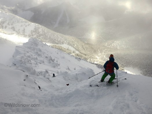 Ruggedtop Skiing off the top of rugged peak during our only day with sunny clear, weather.