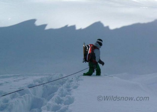 The top of the run rolled to well over 60 degrees (I measured). We decided a belayed ski cut was a wise choice for the first participant. The top of the run rolled to well over 60 degrees (I measured). We decided a belayed ski cut was a wise choice for the first participant.