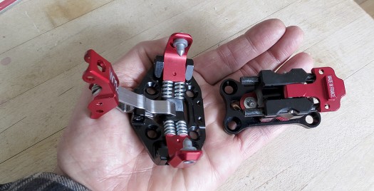 Diminutive Plum race model does not have adjustable safety release, locks automatically when you step in. Diminutive Plum race model does not have adjustable safety release, locks automatically when you step in.