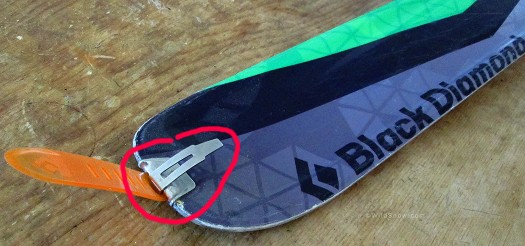 Ski tail climbing skin notch is a somewhat mandatory feature, shown here with climbing skin clip attached. Ski tail climbing skin notch is a somewhat mandatory feature, shown here with climbing skin clip attached.