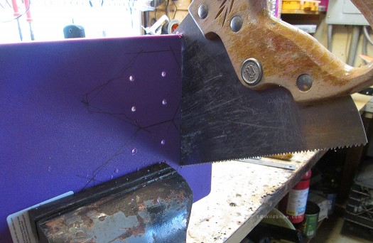 With the straight lines drawn, sawing is relatively easy. A bench vise helps, but isn't mandatory. Important to saw the poly cutting board during warmer temperatures so as not to shatter the plastic. With the straight lines drawn, sawing is relatively easy. A bench vise helps, but isn't mandatory. Important to saw the poly cutting board during warmer temperatures so as not to shatter the plastic.