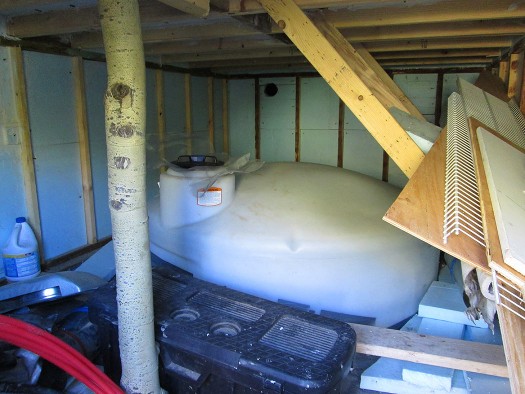 Water storage tank in insulated enclosure. Water storage tank in insulated enclosure.