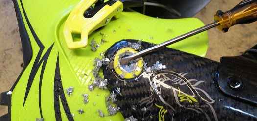 Being ultra careful, you remove just enough material to be able to pop the rivet head off with a screwdriver blade. Being ultra careful, you remove just enough material to be able to pop the rivet head off with a screwdriver blade.