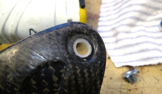 Next, using your step bit drill the cuff hole out to 0.5 inch, being careful not to wobble the bit or over-drill, as the bushing needs to fit snugly. Next, using your step bit drill the cuff hole out to 0.5 inch, being careful not to wobble the bit or over-drill, as the bushing needs to fit snugly.