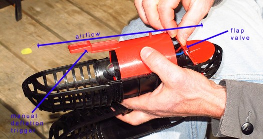 The fan is powerful. When reversed, it slides within the housing and presses the 'fang' against the butterfly valve thus opening it. The fan is powerful. When reversed, it slides within the housing and presses the 'fang' against the butterfly valve thus opening it.
