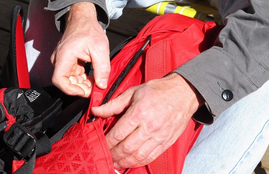 This flap is where the airbag first deploys. It then parts a lightweight coil zipper. This flap is where the airbag first deploys. It then parts a lightweight coil zipper.