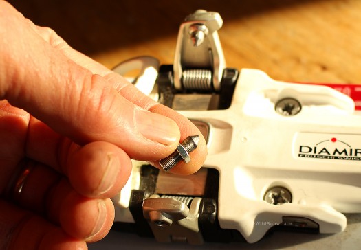 I think it's fair to call this 'odd." One of the toe pins is adjustable. From the mounting instructions, this appears to compensate for variations in tech fitting dimensions. I think it's fair to call this 'odd." One of the toe pins is adjustable. From the mounting instructions, this appears to compensate for variations in tech fitting dimensions.