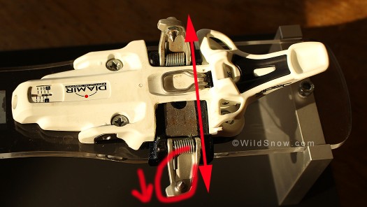 Lateral release is accomplished by toe unit sliding to the side on a track, and one of the wings opening up. Lateral release is accomplished by toe unit sliding to the side on a track, and one of the wings opening up.