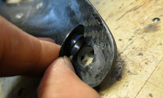 Delrin shoulder bushing is pressed into cuff hole. With normal wear this will be a perfect fit but may require a small amount of enlarging with sandpaper wraped around a drill bit shaft. If the hole is destroyed, B&D may provide an oversized bushing. Delrin shoulder bushing is pressed into cuff hole. With normal wear this will be a perfect fit but may require a small amount of enlarging with sandpaper wraped around a drill bit shaft. If the hole is destroyed, B&D may provide an oversized bushing.