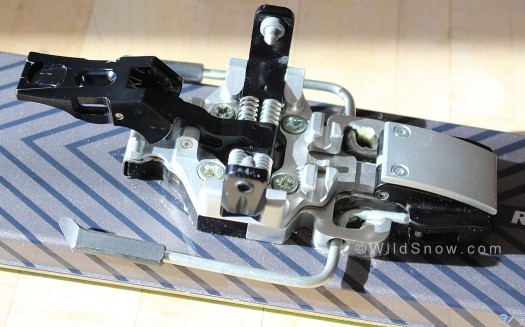 Plum ski binding brake, retracted. Plum ski binding brake, retracted.