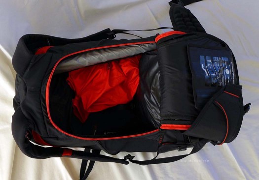 Main compartment, panel loading flap open. Probe and shovel handle ride in horizontal fabric tube visible at top. Main compartment, panel loading flap open. Probe and shovel handle ride in horizontal fabric tube visible at top.
