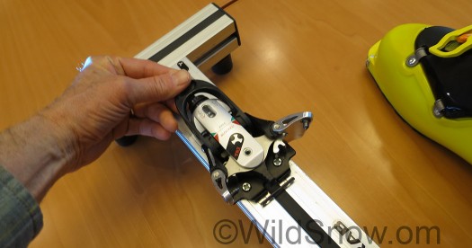 Pressing down this lever opens the toe wings so you can enter or exit the binding. There is no cocking action, instead you have to continuously hold down the lever, which could be annoying. Pressing down this lever opens the toe wings so you can enter or exit the binding. There is no cocking action, instead you have to continuously hold down the lever, which could be annoying.