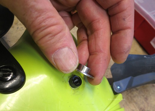 Another shoulder washer drops over the protruding part of the inside washer; this one is stainless steel and the same as the regular all-steel UCP version. Another shoulder washer drops over the protruding part of the inside washer; this one is stainless steel and the same as the regular all-steel UCP version.
