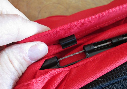 After the bag is deployed you'll see bare cable in the area where the clip is supposed to attach. A simple pull of a 'reset tab' brings the cable back to the closure position with larger diameter that the clip can attach to. After the bag is deployed you'll see bare cable in the area where the clip is supposed to attach. A simple pull of a 'reset tab' brings the cable back to the closure position with larger diameter that the clip can attach to.
