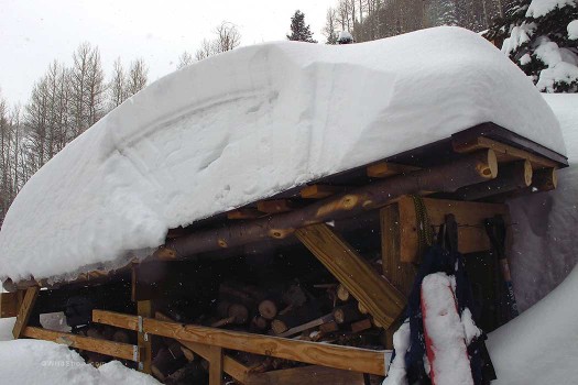 Sheared off snow on top of wood shed to study layers. Unfortunately a dirt layer was deposited by high winds before our last snowfall. The dark layer below the dirt layer is storm crust. Sheared off snow on top of wood shed to study layers. Unfortunately a dirt layer was deposited by high winds before our last snowfall. The dark layer below the dirt layer is storm crust.