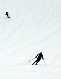 Penn follows his wife Kirstin down the Marble Peak corn bowl, May 2003. Penn follows his wife Kirstin down the Marble Peak corn bowl, May 2003.