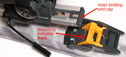 When you drop the main binding end cap in to the pocket in the heel latch unit, be sure it is within 1 millimeter of the mounting indicator mark, preferably exactly centered on the mark. When you drop the main binding end cap in to the pocket in the heel latch unit, be sure it is within 1 millimeter of the mounting indicator mark, preferably exactly centered on the mark.