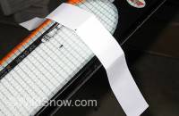 To find center using paper, simply wrap a strip of paper around the ski, crease it over the sharp steel base edges, remove and fold in half using the edge marks as reference, then place back on ski and use the crease to locate center. While simple, work carefully (mainly, mark the spot on your ski where you place the paper, as moving it towards the tip or tail will throw things off because of the ski’s varied width.) To find center using paper, simply wrap a strip of paper around the ski, crease it over the sharp steel base edges, remove and fold in half using the edge marks as reference, then place back on ski and use the crease to locate center. While simple, work carefully (mainly, mark the spot on your ski where you place the paper, as moving it towards the tip or tail will throw things off because of the ski’s varied width.)