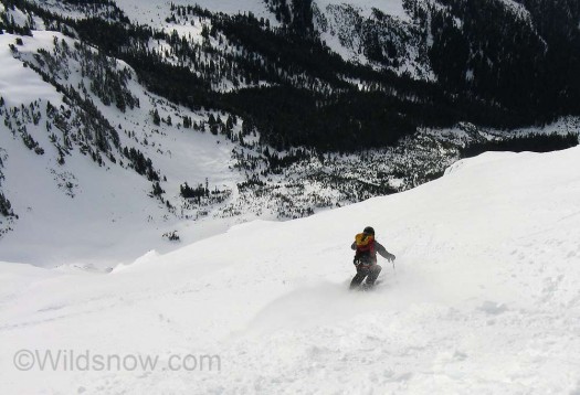 Quin skiing off the summit of Larrabee
